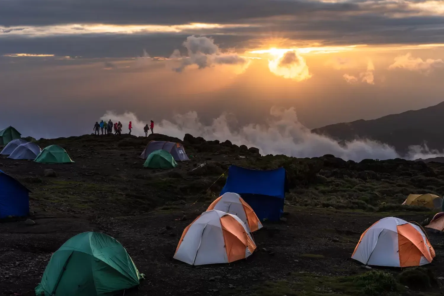 Kilimanjaro climbers on the trail with their guide